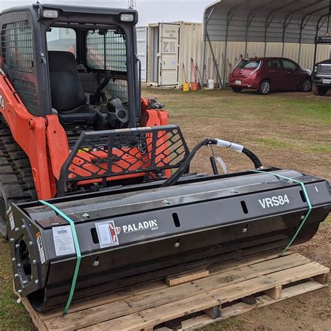 vibrating roller skid steer attachment